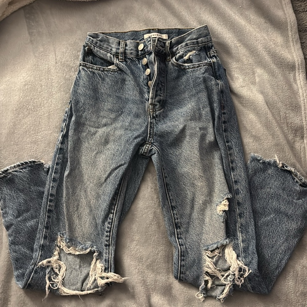 Distressed Blue Jeans